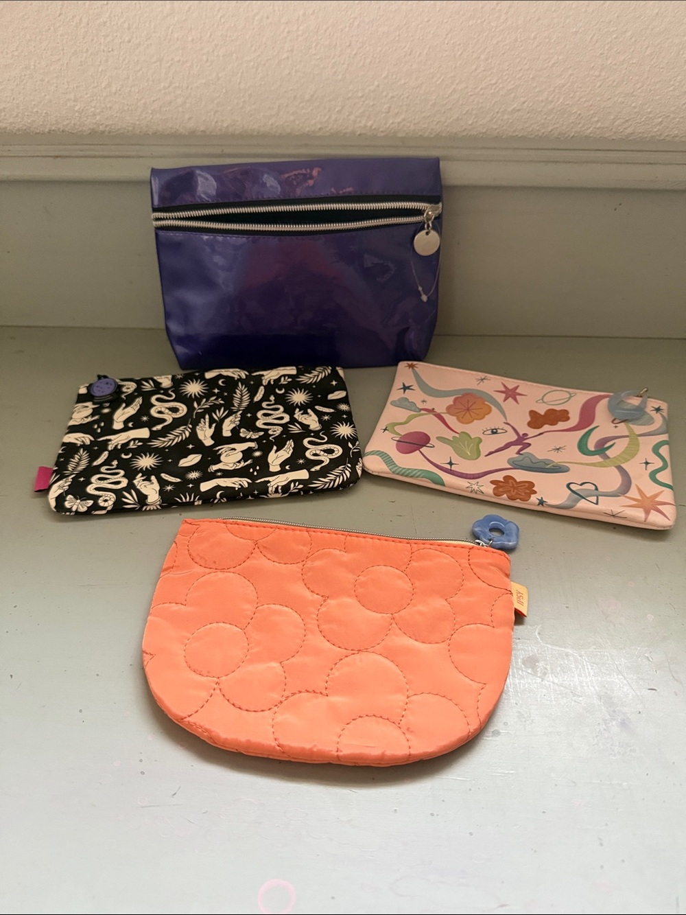 Set of Four Colorful Small Cosmetic Pouches